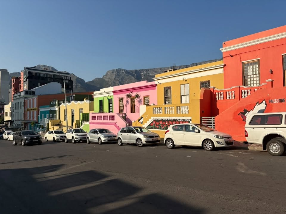 Colourful Bo-Kaap street with Table Mountain in the background