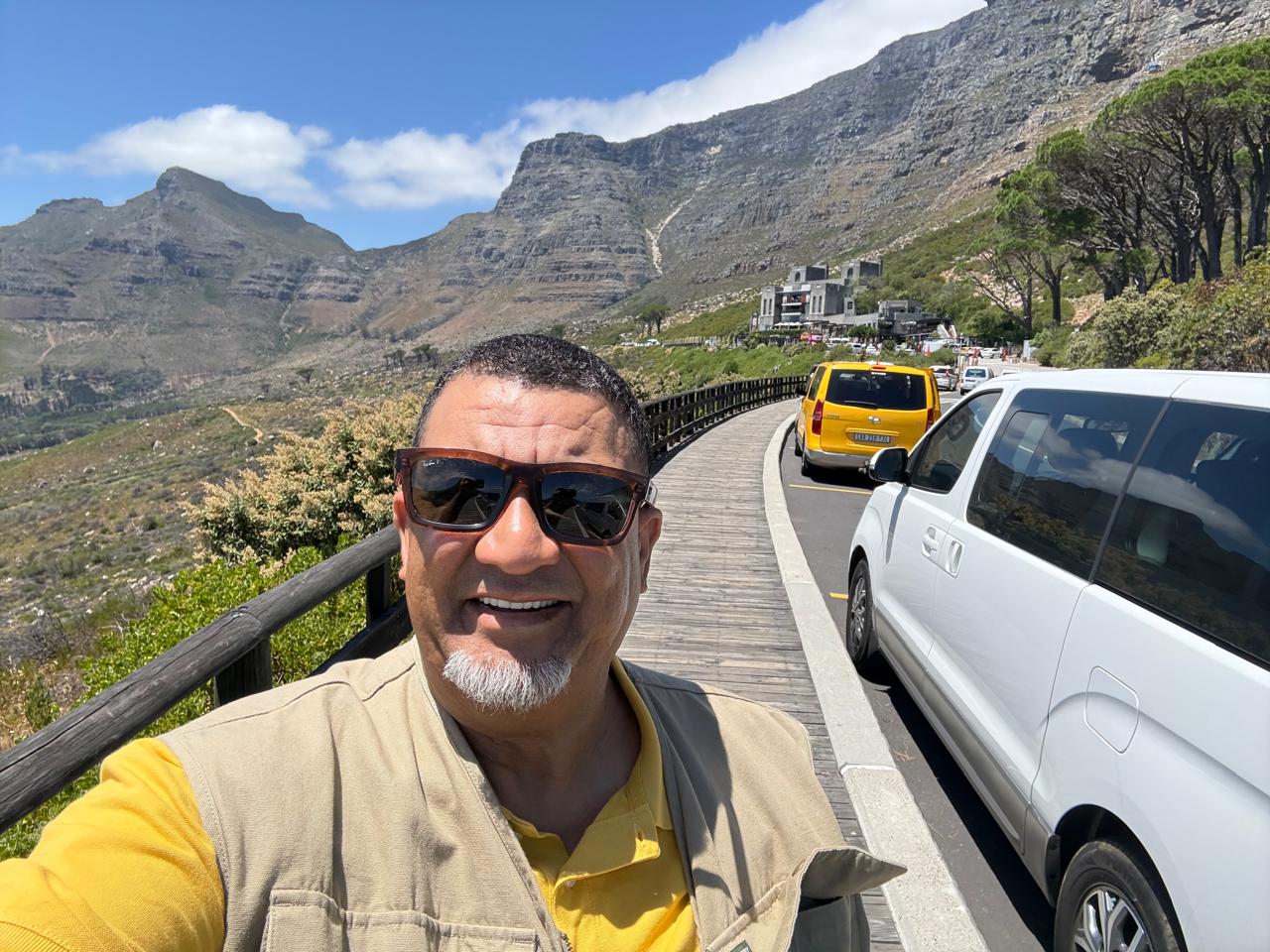 i-Drive minibus on a scenic Cape Peninsula road