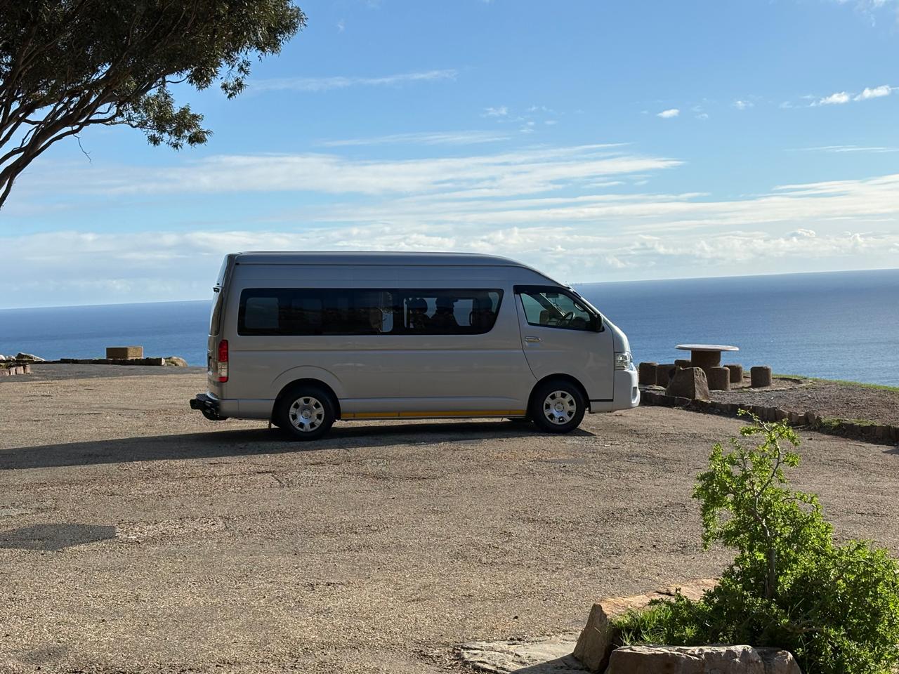 i-Drive fleet vehicles with Cape Peninsula coastal views